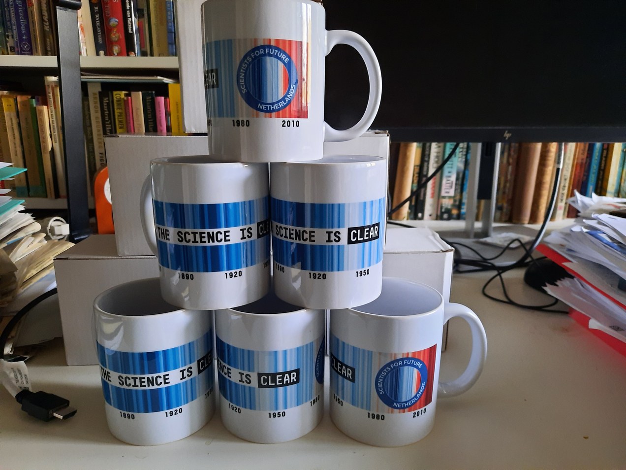 photo of Scientsts for Future NL branded mugs